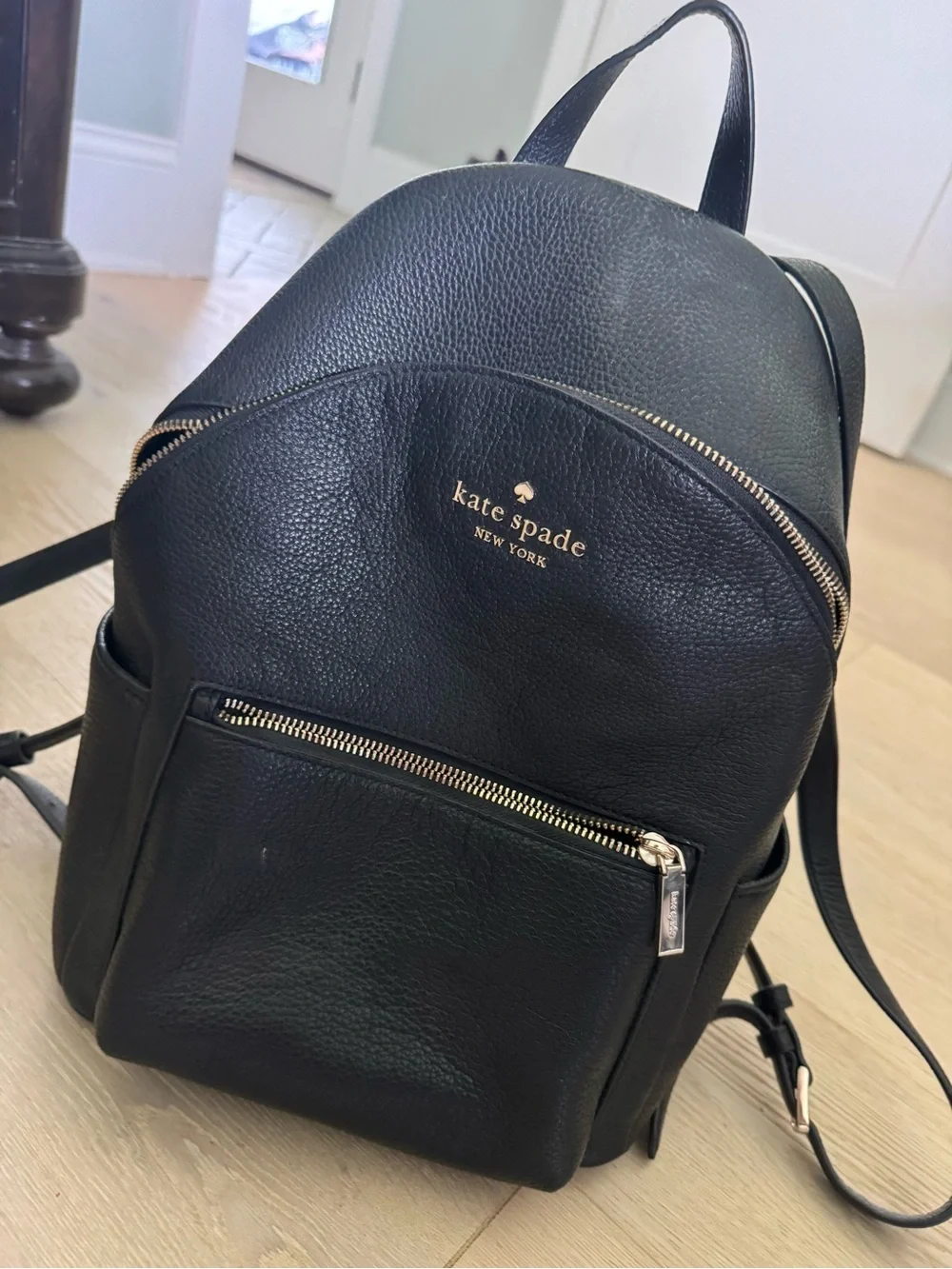 kate spade black leather pebbled backpack with gold hardware